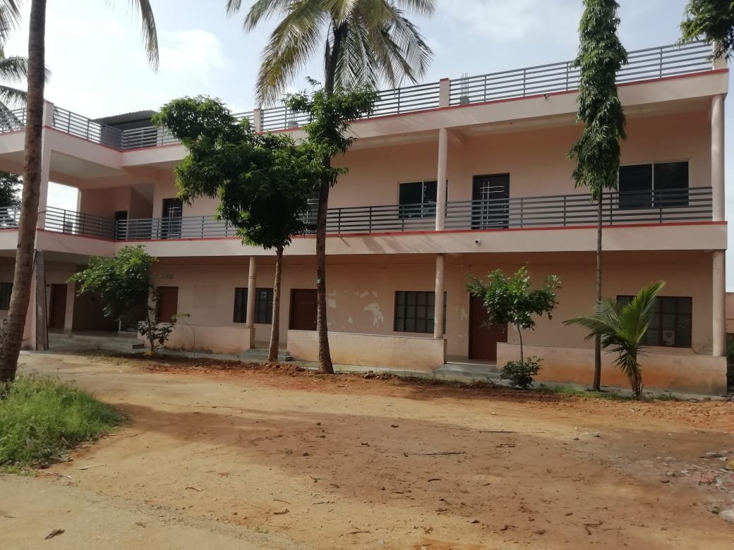 Courtyard and academic building at K.N. Nagegowda Law College